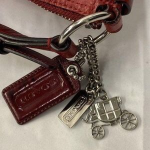 COACH Burgandy Hangtag And Silver Tone Coach Branded Carriage Hangtag